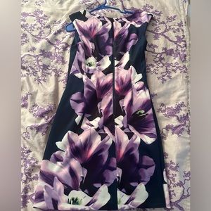 This one of a kind Vince Camuto dress is a must have for spring!